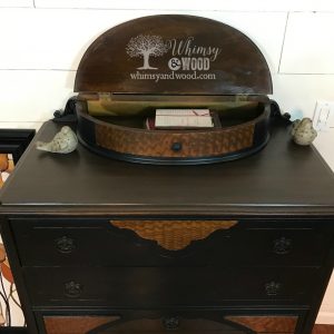 beautiful painted dresser shown with open top